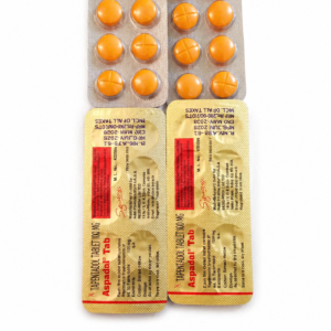 Tapentadol 100 mg tablets in blister packs with orange round pills on white background